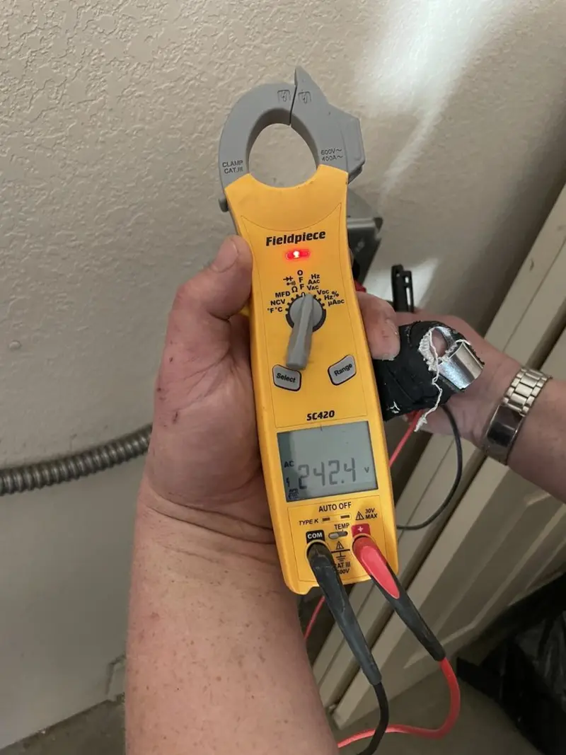 Voltage testing with clamp meter during Generator Installation in Poway